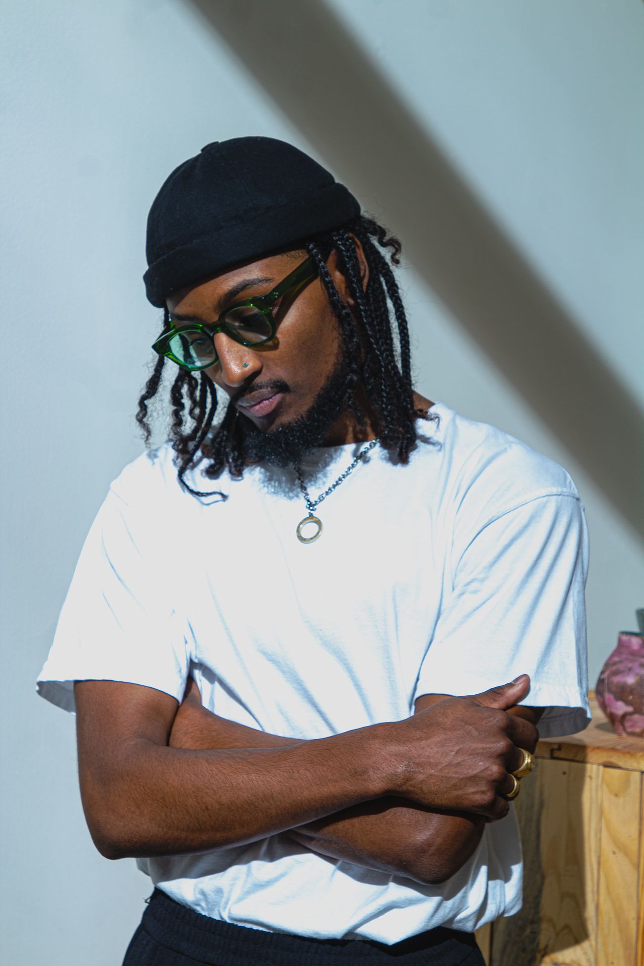 black man photographed with natural light through window