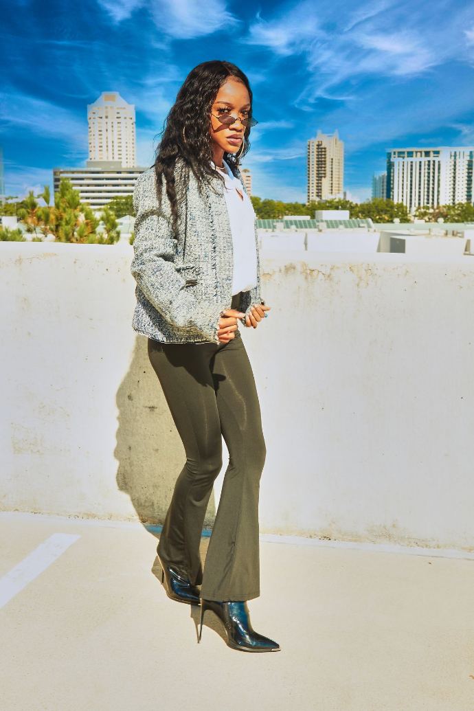 Black women in business attire.