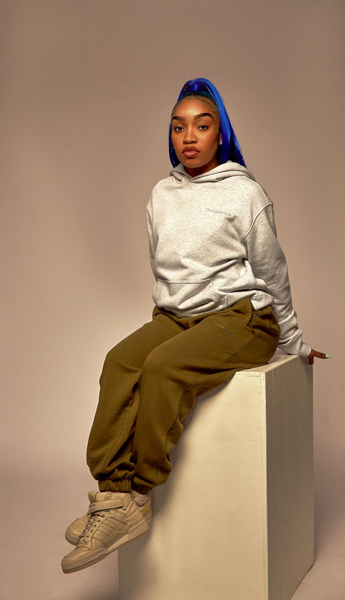 black girl modeling in Human Race by Pharrel and Adidasl